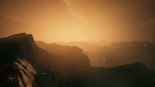High Mountain Peaks Covered with Dramatic Heavy Fog