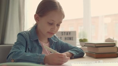 Schoolgirl Is Studying at Home