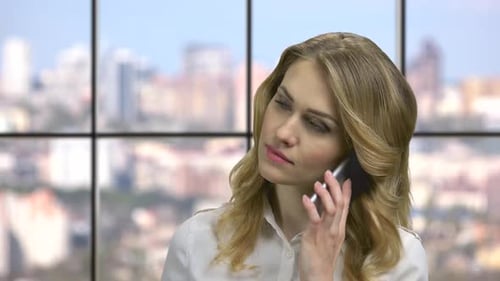 Close Up Young Business Woman Talking on Cell Phone.