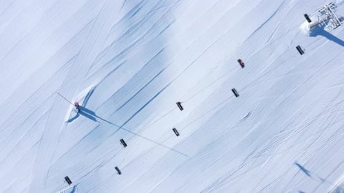 Top Down View of the Ski Lift and the Track in Winter Season