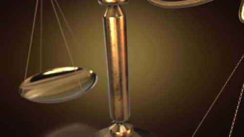 Animated Golden Scales of Justice Symbolizing Law and Balance
