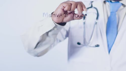 Doctor Writes Motivate Yourself on Glass