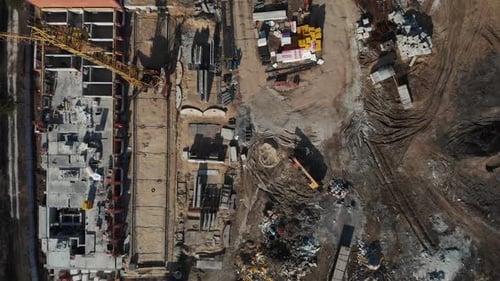 Drone Flying Over a Construction Site with a Top Down View. The Camera Flies Superstructure, Top