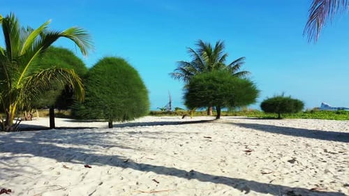 Beautiful aerial abstract shot of a sunshine white sandy paradise beach and aqua blue water backgrou