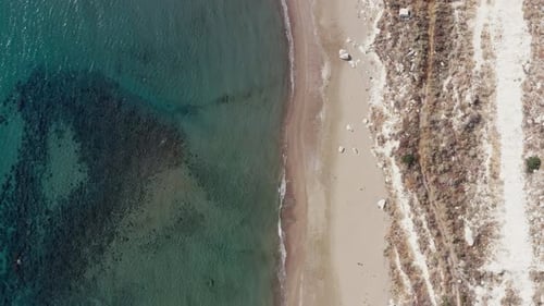 Aerial View of the Beach in the Mediterranean Sea with a Rocky Shore