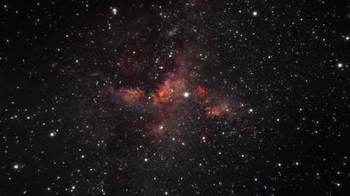 Flight through glowing nebulae and stars.