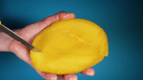 Slicing a Yellow Mango with Paring Knife