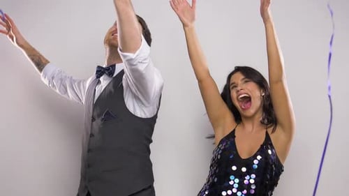 Happy Couple Dancing With Balloons at Birthday Celebration