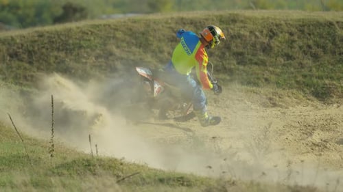 Riding a motocross and leaving dust behind