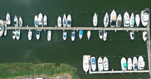 Aerial view panorama of wood platform for boat in the ocean little pier marina