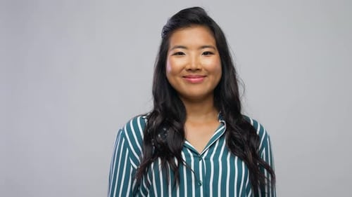 Young Woman Smiling and Laughing Portrait in Studio