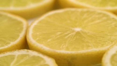 Lemon Slices Closeup, Macro Food Summer Background, Fruits Top View. Rotate