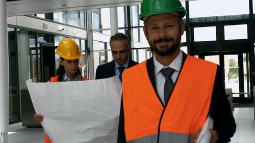 Portrait of architect standing in office building