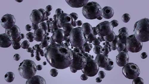 Fresh Blueberries Floating With Water Drops In Slow Motion