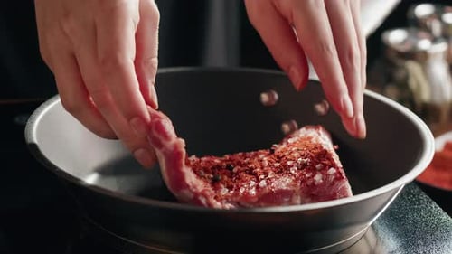 Chef Frying Ribs Closeup