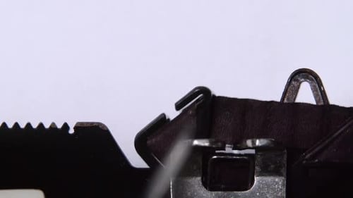 Applicant Prints a Resume on a Retro Typewriter. Close Up