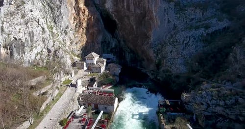 Aerial View of Picturesque Canyon Settlement by River
