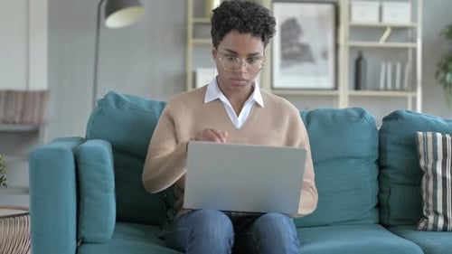 Young African Girl Leaving Couch After Work Get Done