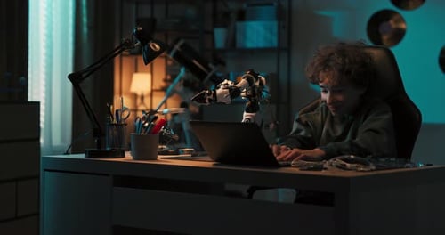 Boy Builds Robot in Bedroom at Night