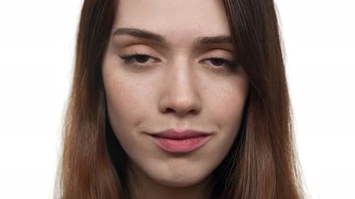 Young Woman Smiling in Close-Up Portrait