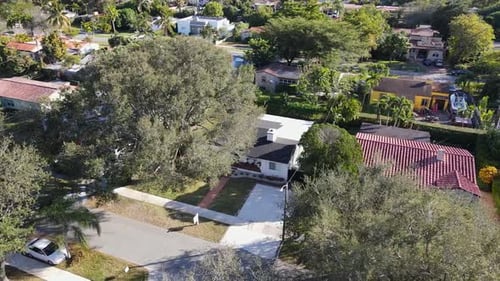 Aerial View of Homes in Suburban Neighborhood on Sunny Day