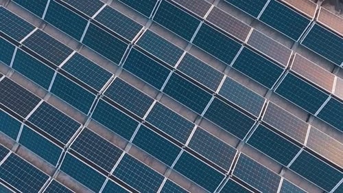Solar panels on rooftop. Aerial top down view of solar panels