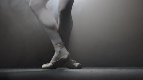 Ballet Dancer Practicing on Pointe Shoes in Studio
