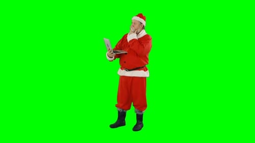 Santa claus using laptop