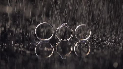 Wedding Rings Sparkling in Rain, Close Up Shot