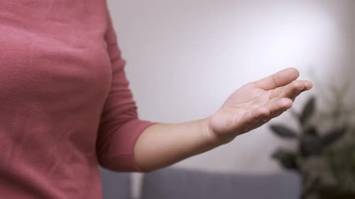 Woman Applies Hand Sanitizer For Hygiene