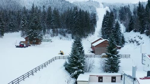 Aerial View of Snowy Winter Ski Resort Landscape