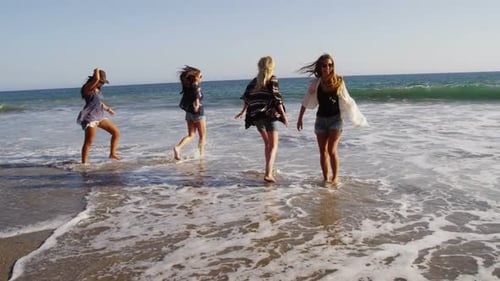 Group of young people together at beach