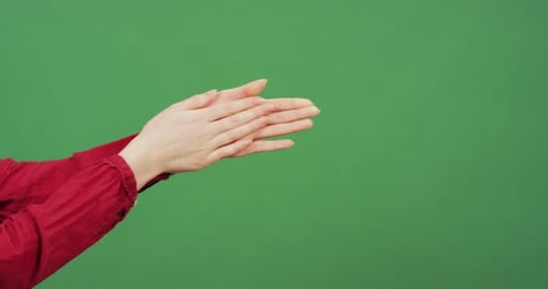 Hands Clapping on a Green Screen