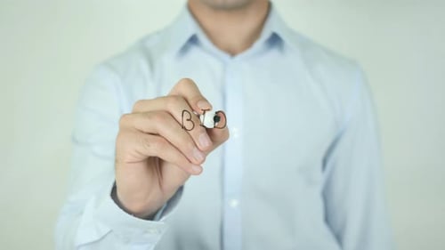 Writing the word BID on transparent surface