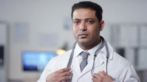 Doctor Wearing Stethoscope in Hospital Close Up