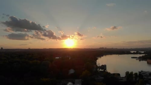 Beautiful Sunset with Clouds over River