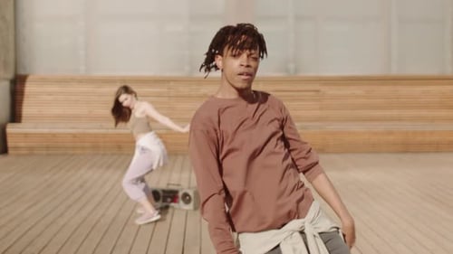 Man Dancing Outdoors on Sunny Day