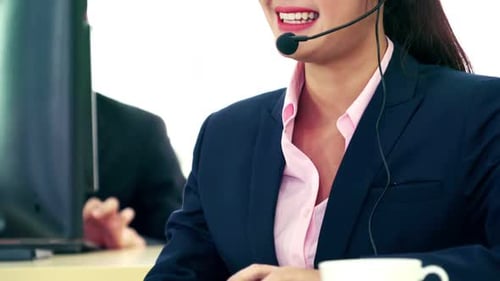 Business People Wearing Headset Working in Office