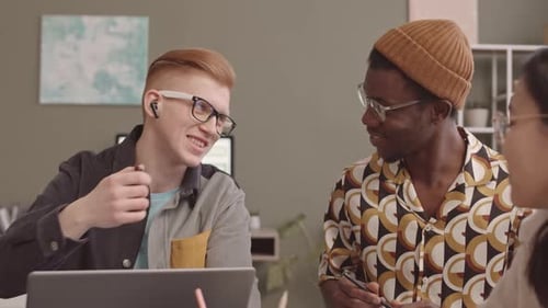 Diverse Team of Startupers Coworking in Office