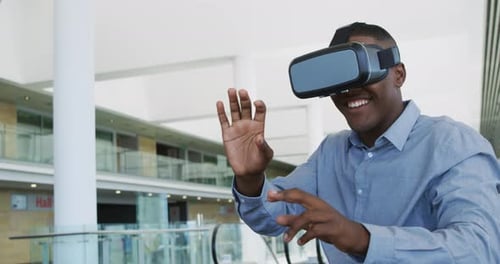 Businessman using VR in a modern office