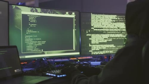 Hoodied Hacker Coding in Underground Computer Club