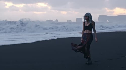 Tattooed Blue Haired Girl On Black Beach