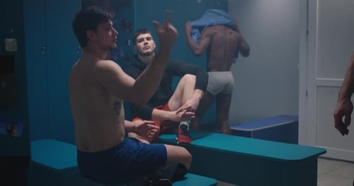 Men Arguing in Locker Room