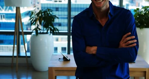 Confident male executive in office