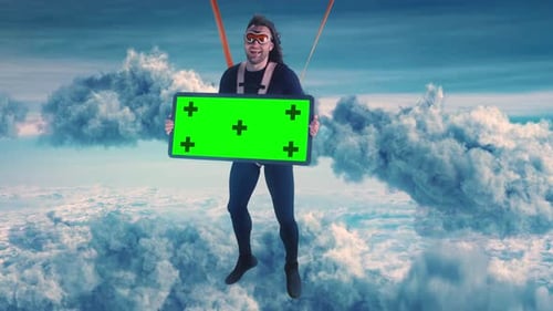 Man Holding Chroma Key Sign with Clouds