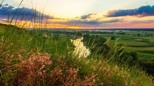 Picturesque Sunrise Over Lush Green River Valley