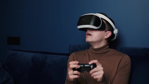 Man Enjoys Immersive VR Gaming at Home