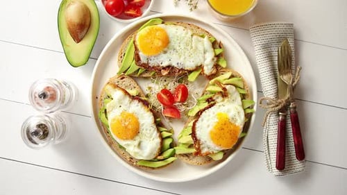 Healthy Avocado Toast with Fried Eggs Overhead
