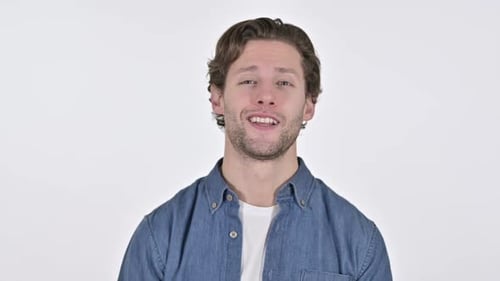 Video Chat By Cheerful Young Man on White Background