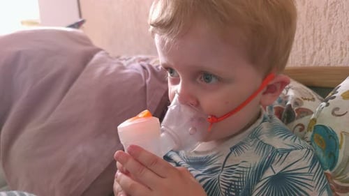 Little Boy And Steam Inhaler